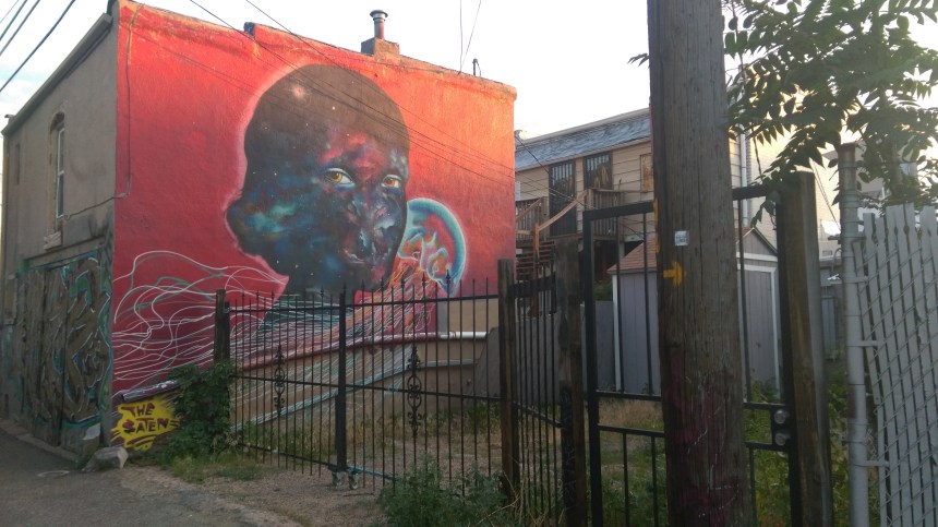 She could be a Dreamer, I suppose, with the universe before her but the tentacles of this nation's unjust policies stinging and strangling her head. I found her when returning from the Santa Fe art walk in Denver.  PC: Katelyn Skye Bennett